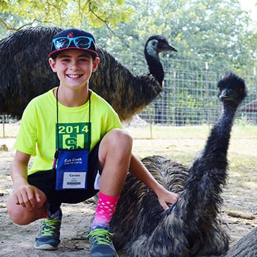 Adopt An Animal Back Pastures - Camper with adopted emus - Cub Creek Science and Animal Camp