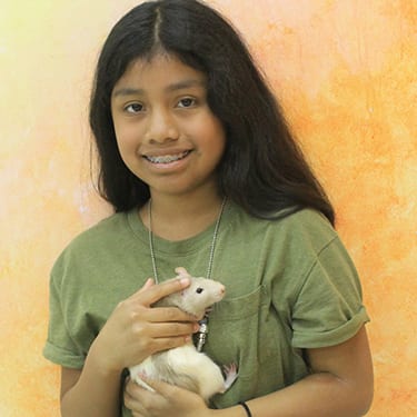 Adopt An Animal Small Animals - Camper holding rat - Cub Creek Science and Animal Camp