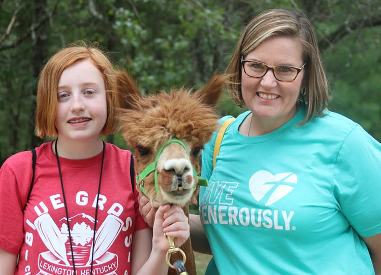 First Time Families - Camper family with Alpaca - Cub Creek Science and Animal Camp