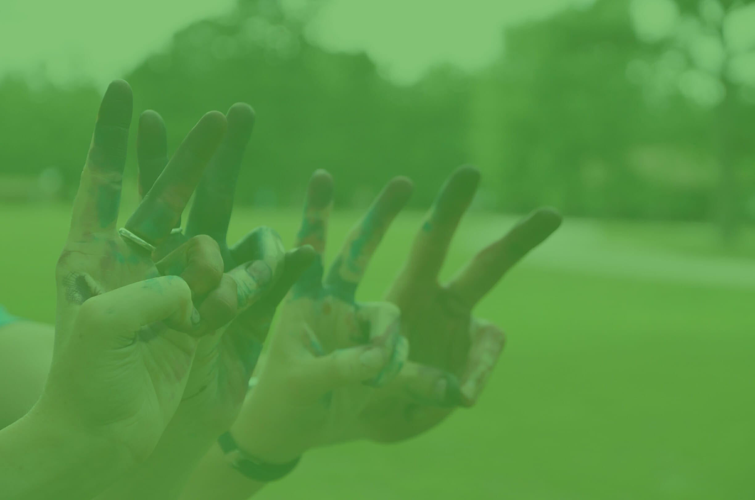 Home Page Testimonial Image - Happy camper hands giving peace sign - Cub Creek Science and Animal Camp