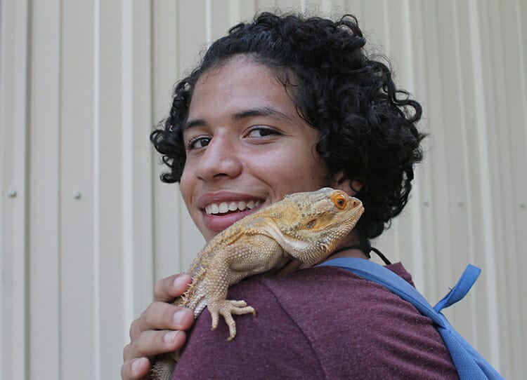 Leadership Programs - ASIT camper with bearded dragon - Cub Creek Science and Animal Camp