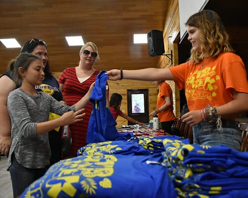 Leadership Programs - ASIT camper helping with check in day - Cub Creek Science and Animal Camp