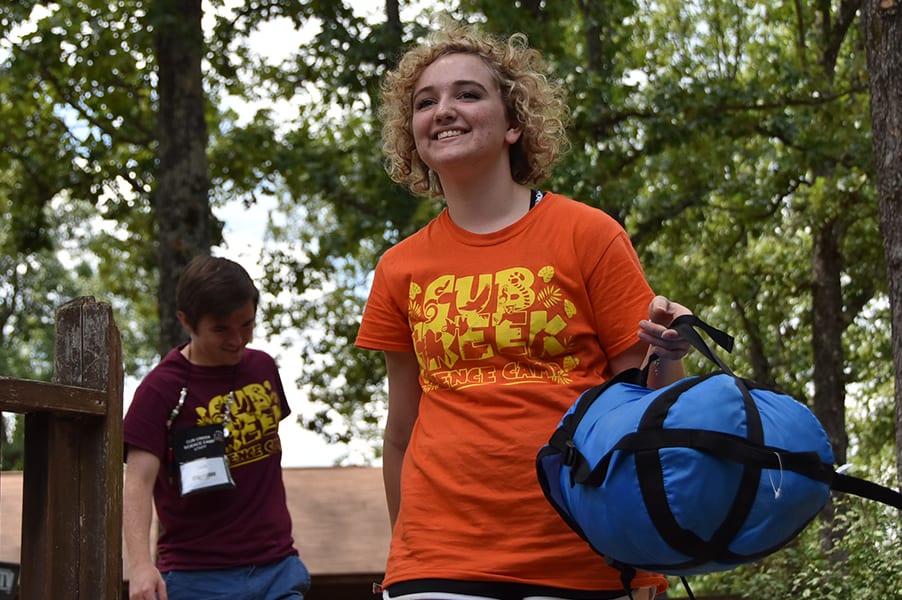 Lost And Found - ASIT camper helping with luggage on check in day - Cub Creek Science and Animal Camp