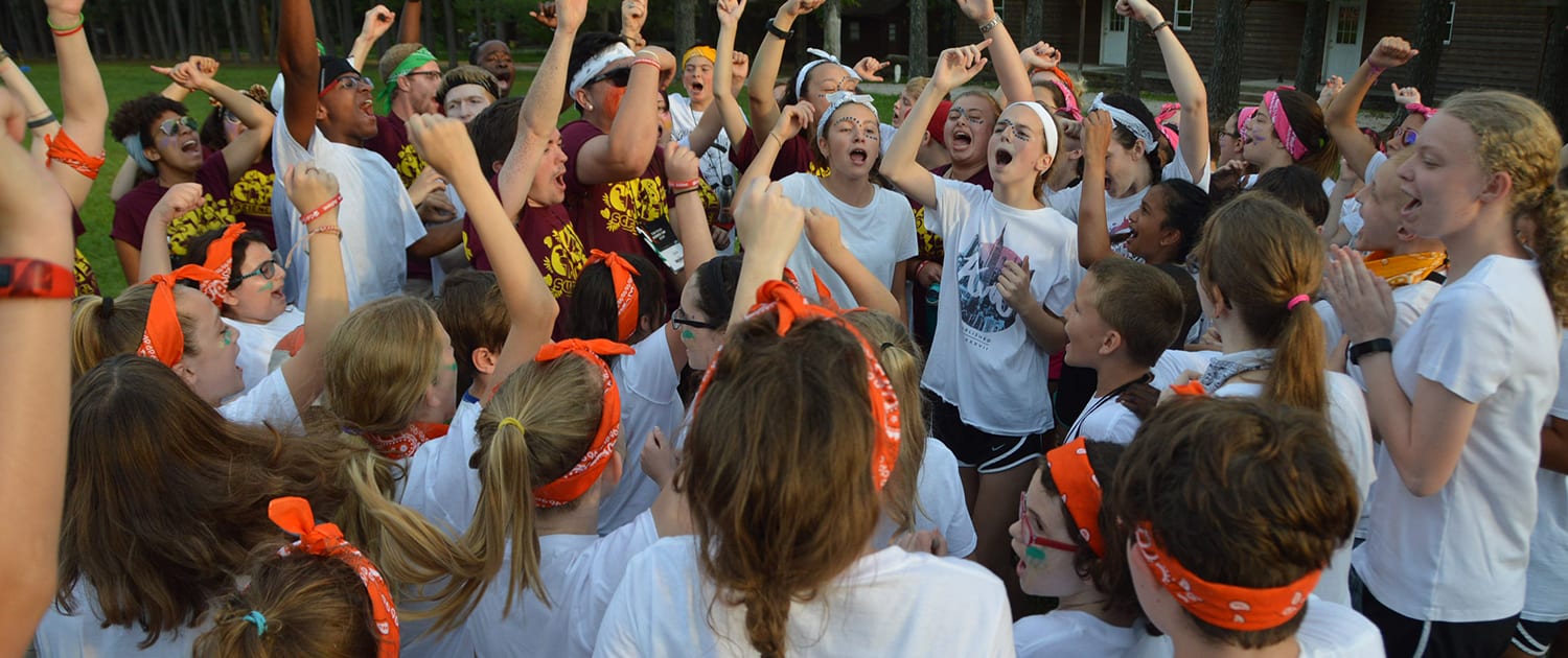 Scholarships - Campers cheering evening activity - Cub Creek Science and Animal Camp